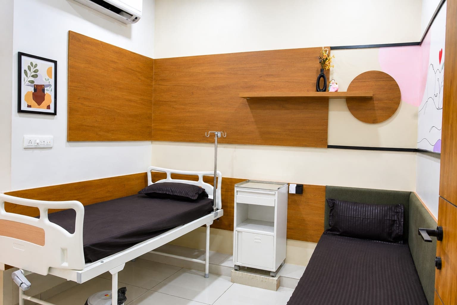 Private patient room with attached amenities at Krisha Women's Hospital